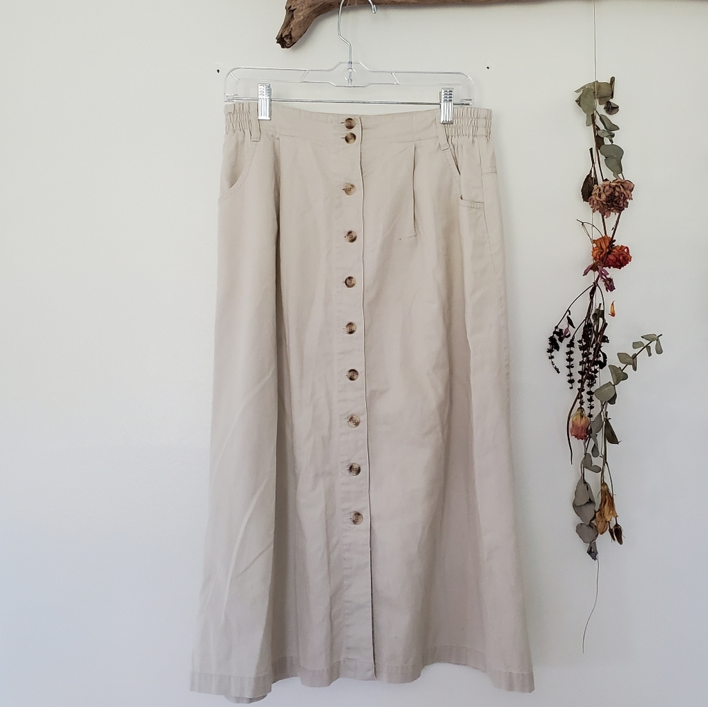 Beige midi skirt.
